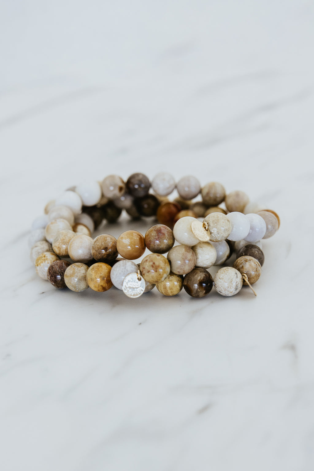 Wings Hawaii fossil coral stretchy bracelet. Boho-chic jewelry hand made in Maui. 