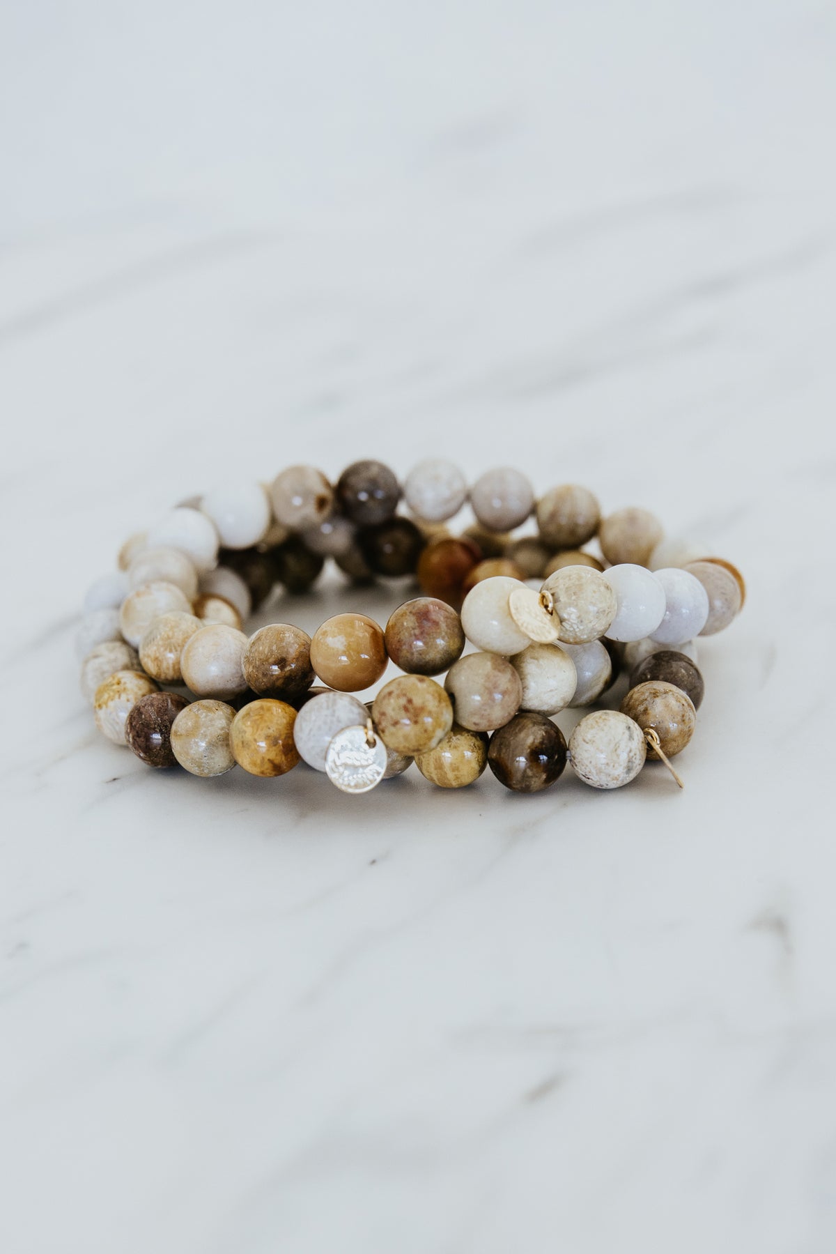 Wings Hawaii fossil coral stretchy bracelet. Boho-chic jewelry hand made in Maui. 