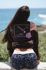 Wings Hawaii Long Sleeve Crop Tee in brown. Aloha design on front, vintage Hawaiian Islands map on back. Original artwork designed in Maui. Small batch, sustainable, women's apparel. 