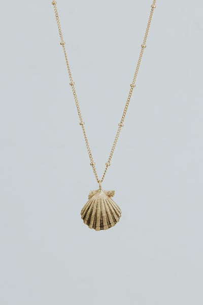 Wings Hawaii Forever Sunrise Shell Necklace in sterling silver or 14k yellow gold. Fine jewelry handmade in Maui. 