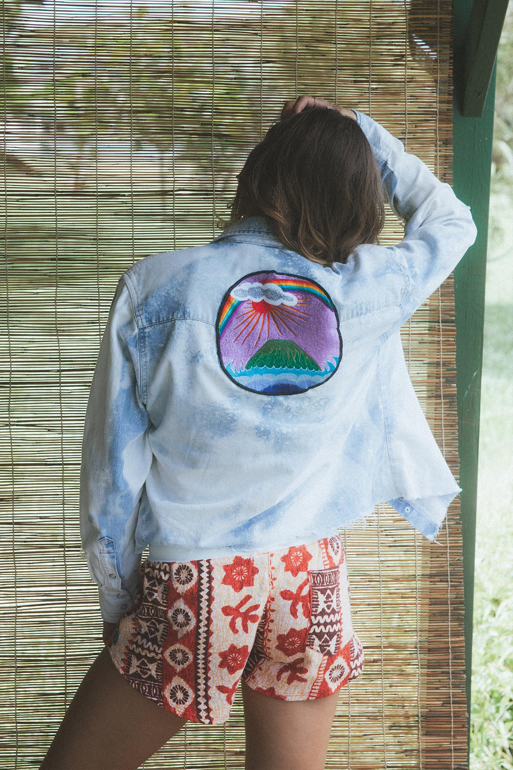 Wings Hawaii vintage collage chambray cropped shirt with Maui island artwork on back and Hawaii design on front. Upcycled and handmade in Maui. Sustainable, small batch, slow fashion handcrafted with aloha in Hawaii. 
