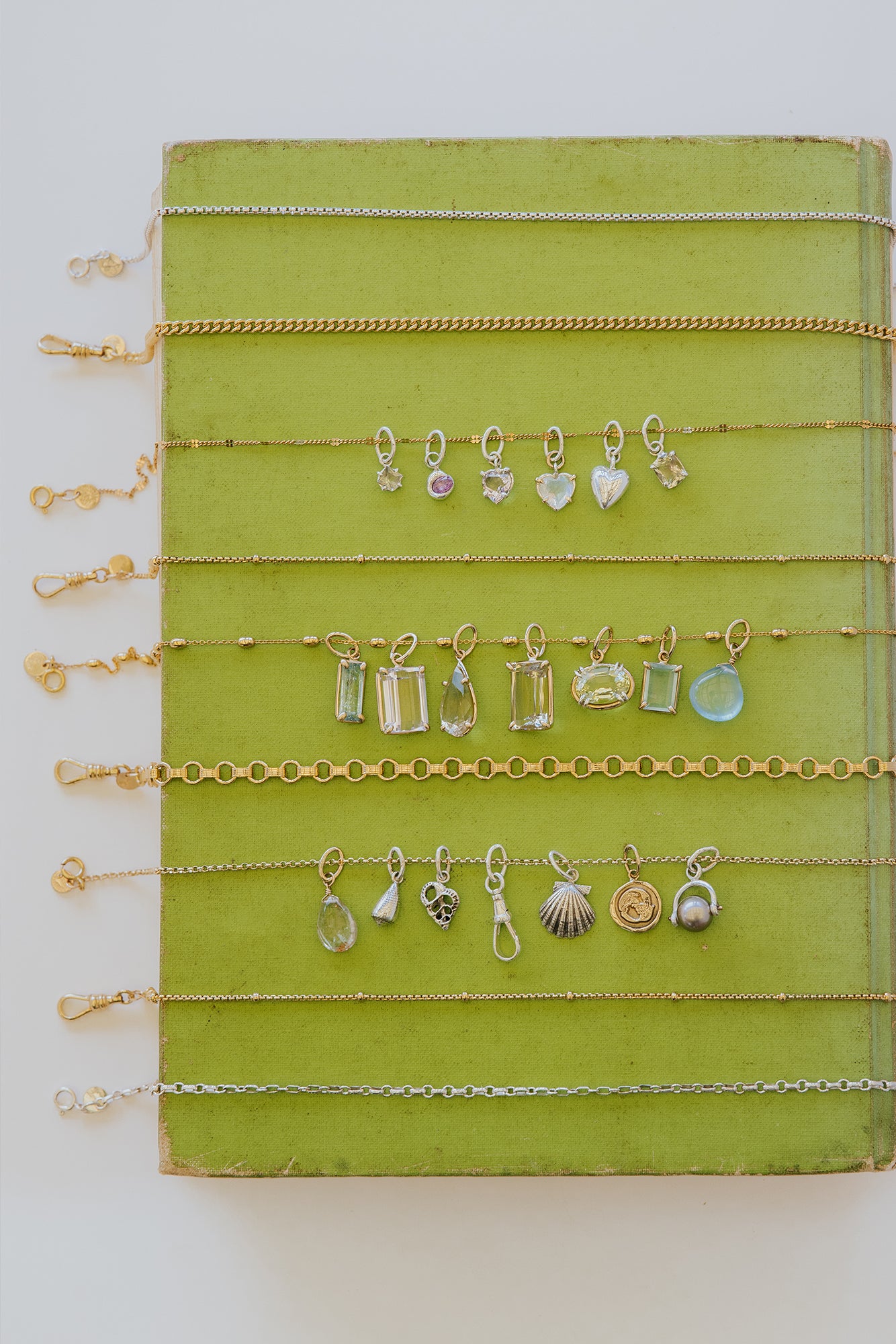 chain options and necklace charms in gold and silver