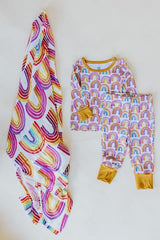 Wings Hawaii rainbow keiki pajamas shown with rainbow baby swaddle thumbnail