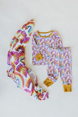 Wings Hawaii rainbow keiki pajamas  shown with rainbow baby swaddle thumbnail