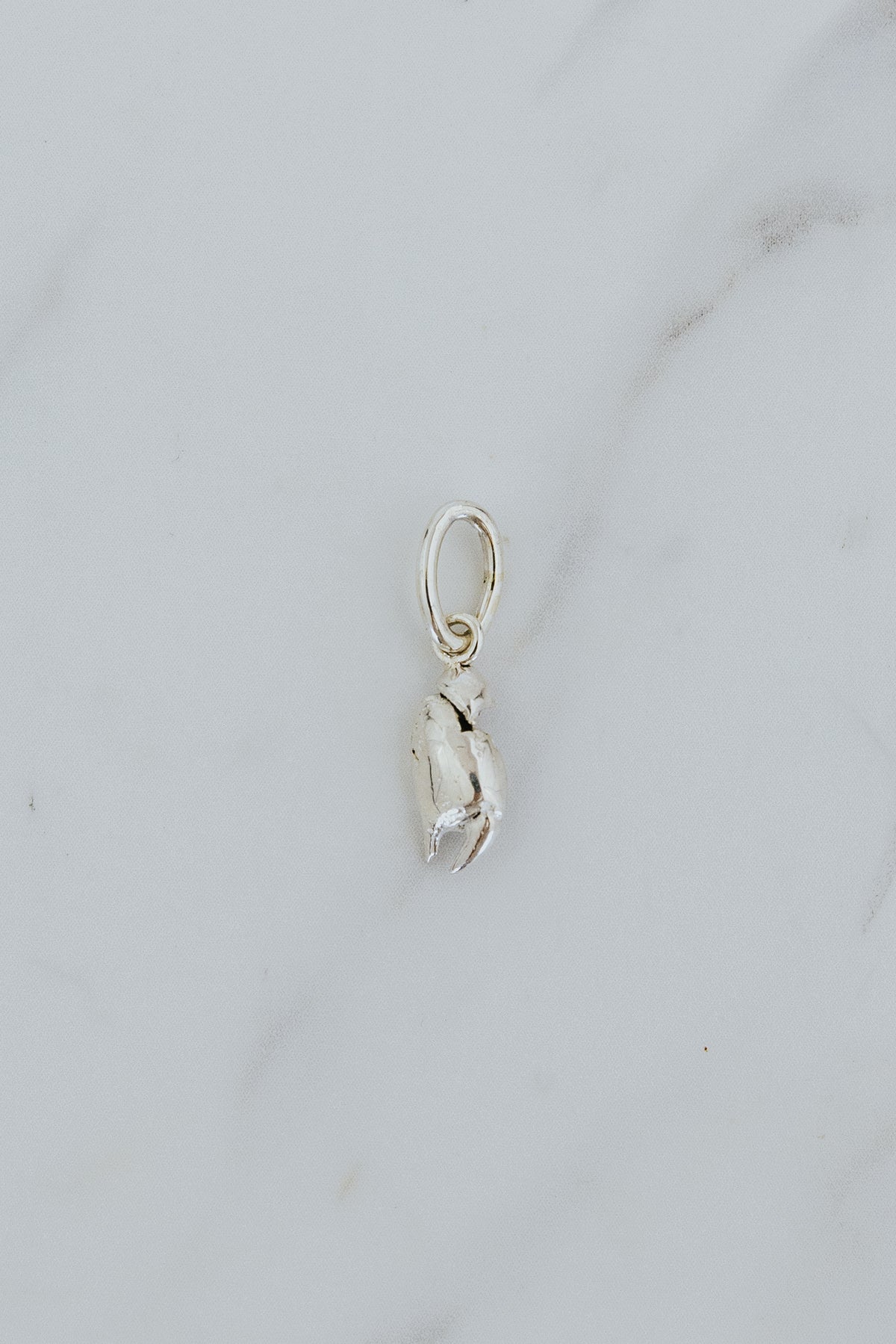 Wings Hawaii Crab Claw necklace charms in sterling silver. Large or small slide-on charms. Fine jewelry handcrafted in Maui. Charm Bar collection, modern charm necklaces made in Hawaii