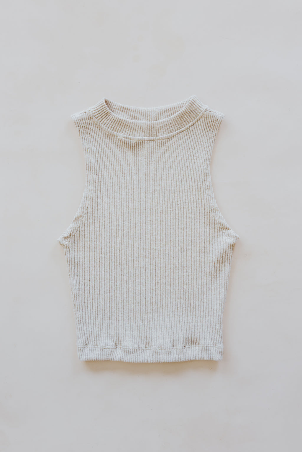 Wings Hawaii Ribbed Lexi Tank Top. Stretchy high neck cropped tank top in neutral Beige cream off-white. Perfect layering piece. Designed in Maui, sewn in Bali. Sustainable, small batch, boho beachy chic women's apparel.