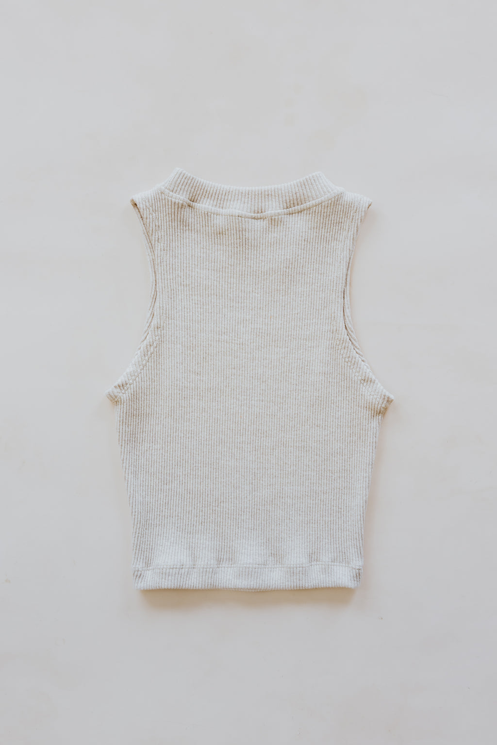 Wings Hawaii Ribbed Lexi Tank Top. Stretchy high neck cropped tank top in neutral Beige cream off-white. Perfect layering piece. Designed in Maui, sewn in Bali. Sustainable, small batch, boho beachy chic women's apparel.