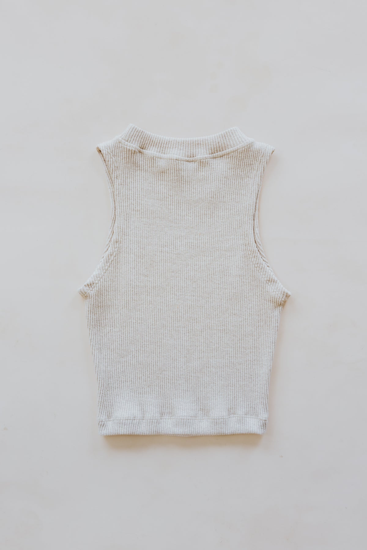 Wings Hawaii Ribbed Lexi Tank Top. Stretchy high neck cropped tank top in neutral Beige cream off-white. Perfect layering piece. Designed in Maui, sewn in Bali. Sustainable, small batch, boho beachy chic women's apparel.