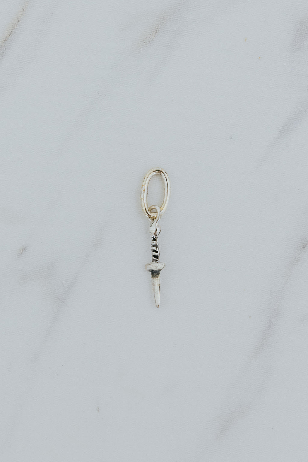 Wings Hawaii dagger knife necklace charm in sterling silver. Fine jewelry handcrafted in Maui. Charm Bar collection, modern charm necklaces made in Hawaii