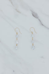 Wings Hawaii drop chain triple pearl earrings in 14k yellow gold. Six total white uncultured Tahitian pearls on dangle earrings. Fine jewelry handmade in Maui. 