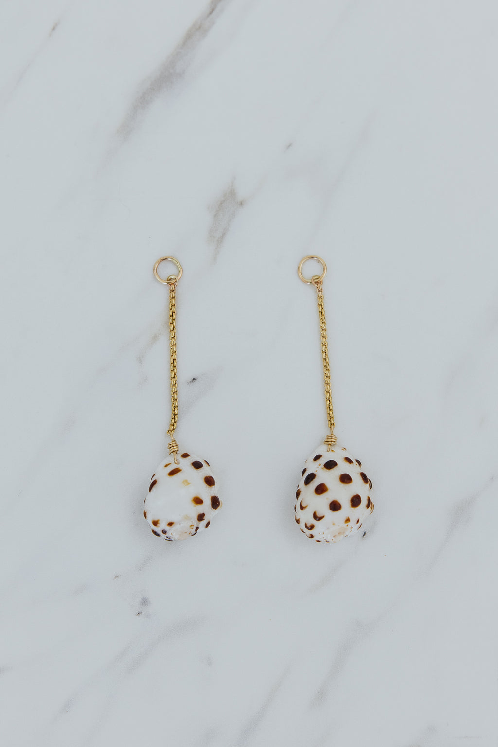 Wings Hawaii Drop Chain Drupe Shell earring charms in sterling silver. Fine jewelry handcrafted in Maui. Mix, match, layer, customize with our Charm Bar Collection. Modern, beachy, boho chic shell jewelry made in Hawaii. 