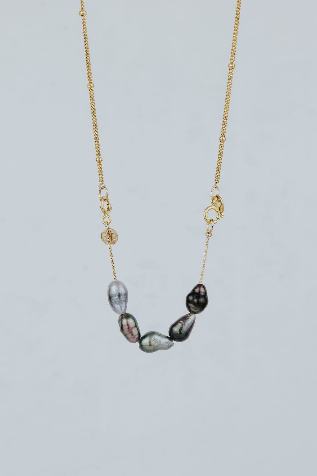 Wings Hawaii Keshi Tahitian Pearl Necklace Extender in 14k gold fill. Clasp on to chain necklaces for a unique charm style. Fine jewelry handmade in Maui. 
