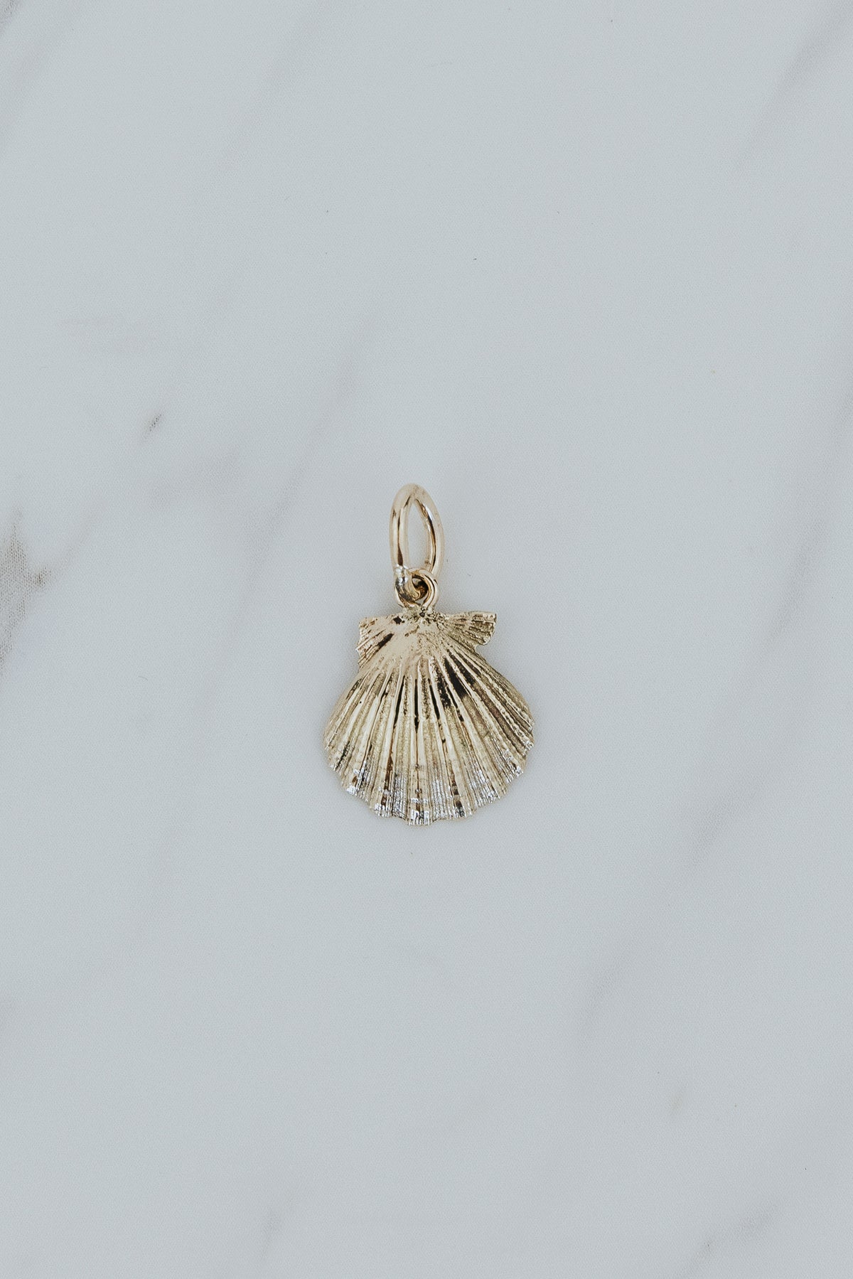 Wings Hawaii Forever Sunrise Shell Necklace Charm in solid 14k yellow gold. Fine jewelry handmade in Maui. 
