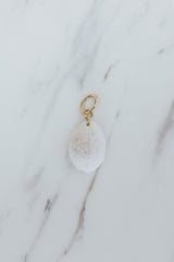Wings Hawaii Granulated Cowrie Shell necklace charms in 14k gold filled. Fine shell jewelry handcrafted in Maui. Modern beachy charm necklaces handmade with authentic Hawaiian sea shells.  thumbnail