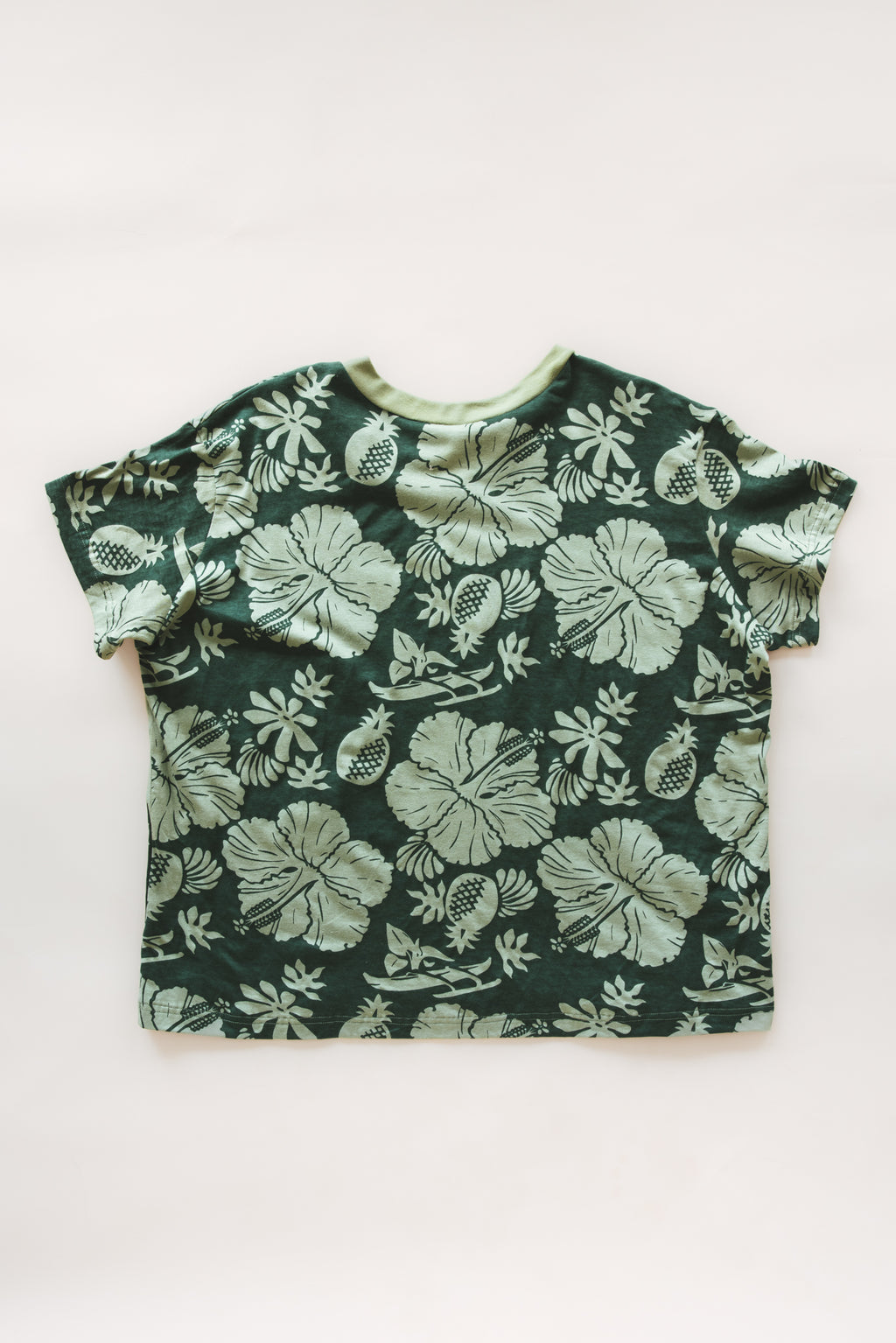Wings Hawaii women's green Hana Forest aloha print t-shirt in hemp/organic cotton blend. Designed in Maui, made in Bali. Small batch, sustainable apparel for modern tropical lifestyle. 