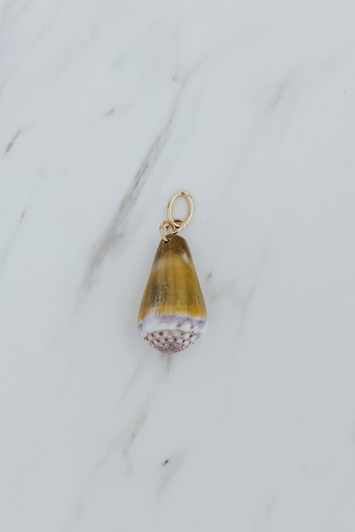 Wings Hawaii purple and green Cone Shell necklace charms in 14k gold-filled or sterling silver. Fine shell jewelry handcrafted in Maui. Modern beachy charm necklaces handmade with authentic Hawaiian sea shells. 