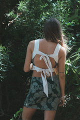 Wings Hawaii Retro Pocket Mini Skirt in Hana Forest. Dark and light green aloha print. Hand-drawn artwork designed in Maui, sewn in Bali. Small batch, sustainable, high quality women's apparel made with aloha.  thumbnail