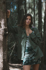 Wings Hawaii Retro Pocket Mini Skirt in Hana Forest. Dark and light green aloha print. Hand-drawn artwork designed in Maui, sewn in Bali. Small batch, sustainable, high quality women's apparel made with aloha.  thumbnail
