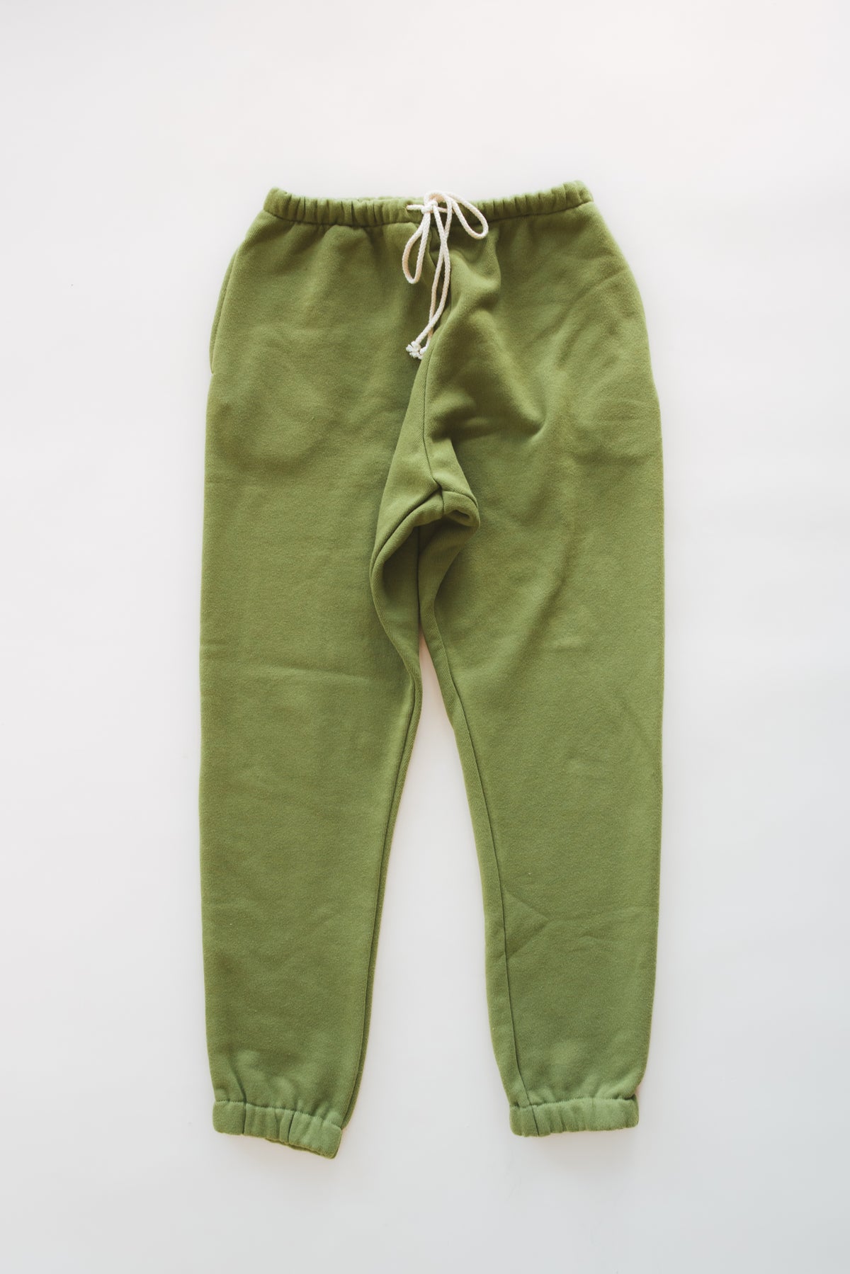Wings Hawaii Green Joggers in 100% cotton. Designed in Maui, made in Los Angeles, USA. Small batch, sustainable, beach-inspired, elevated essentials. 