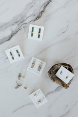 Wings Hawaii green tourmaline banded crystal stud earrings in 14k yellow gold, 14k rose gold, or 14k gold-fill. Fine jewelry handcrafted in Maui. Unique crystal jewelry handmade in Hawaii. 