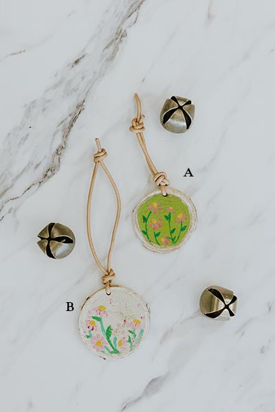 wings hawaii hand-painted birch wood ornaments with leather loops. Style A green background or style B white background 