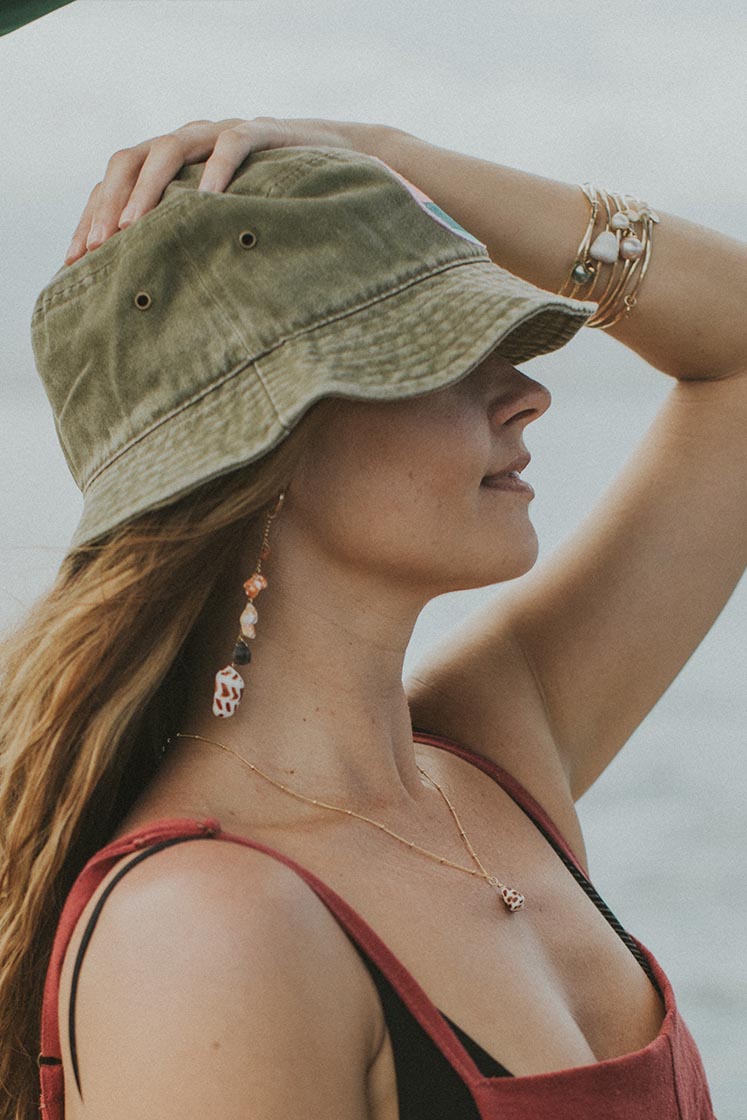 Wings Hawaii shell pile charm hoop earrings with real Hawaiian sea shells and aquamarine beads in 14k gold-filled. Fine jewelry gifts handmade in Maui. 