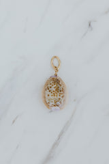 Wings Hawaii Honey Cowrie Shell necklace charms in 14k gold-filled. Fine shell jewelry handcrafted in Maui. Modern beachy charm necklaces handmade with authentic Hawaiian sea shells.  thumbnail