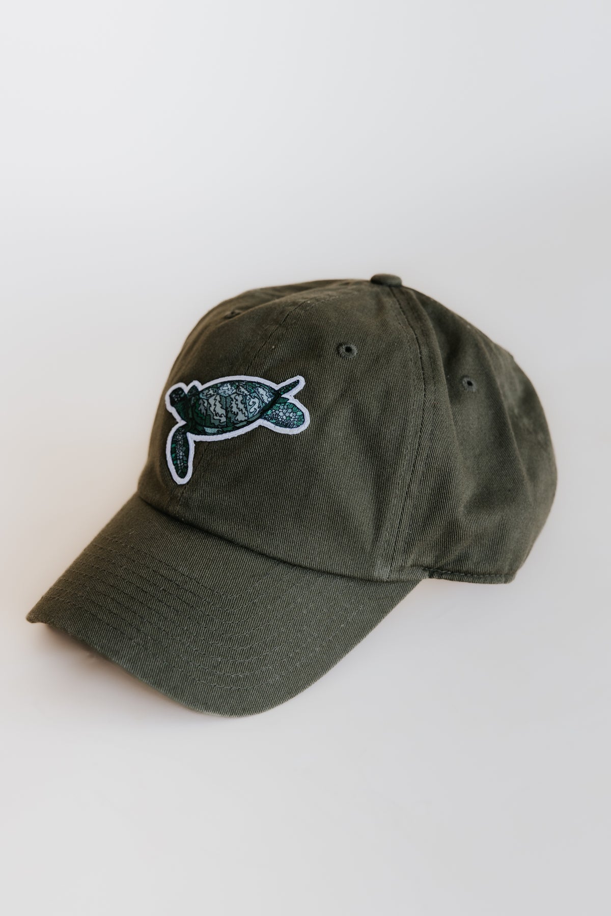 Wings Hawaii honu dad hat. Sea Turtle baseball cap from Maui. Visit our Paia boutique shop for unique gifts and Hawaii souvenirs. 