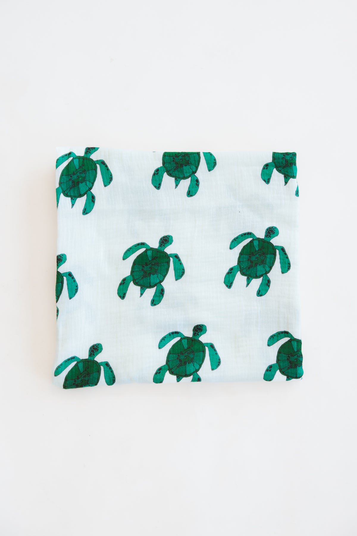 Wings Hawaii baby swaddle blanket with honu sea turtles print. Original artwork designed in Maui. Best baby shower gifts, nursing cover, new mommy gifts. Island style keiki accessories. 