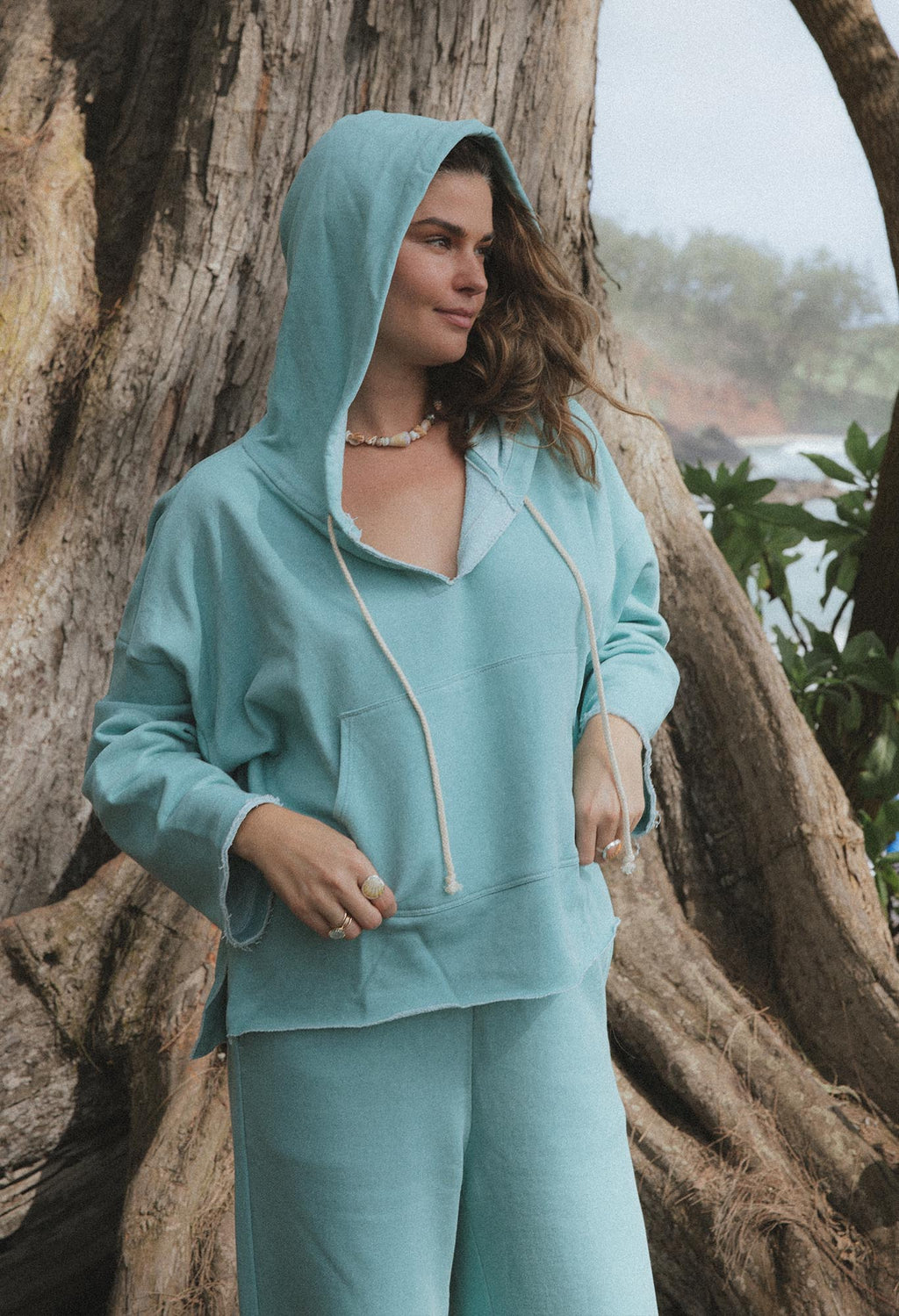 Wings Hawaii Beach Hoodie sweatshirt in aqua blue. 100% cotton french terry. Elevated apparel, sustainable essentials for coastal living. Designed in Maui, sewn in LA. 