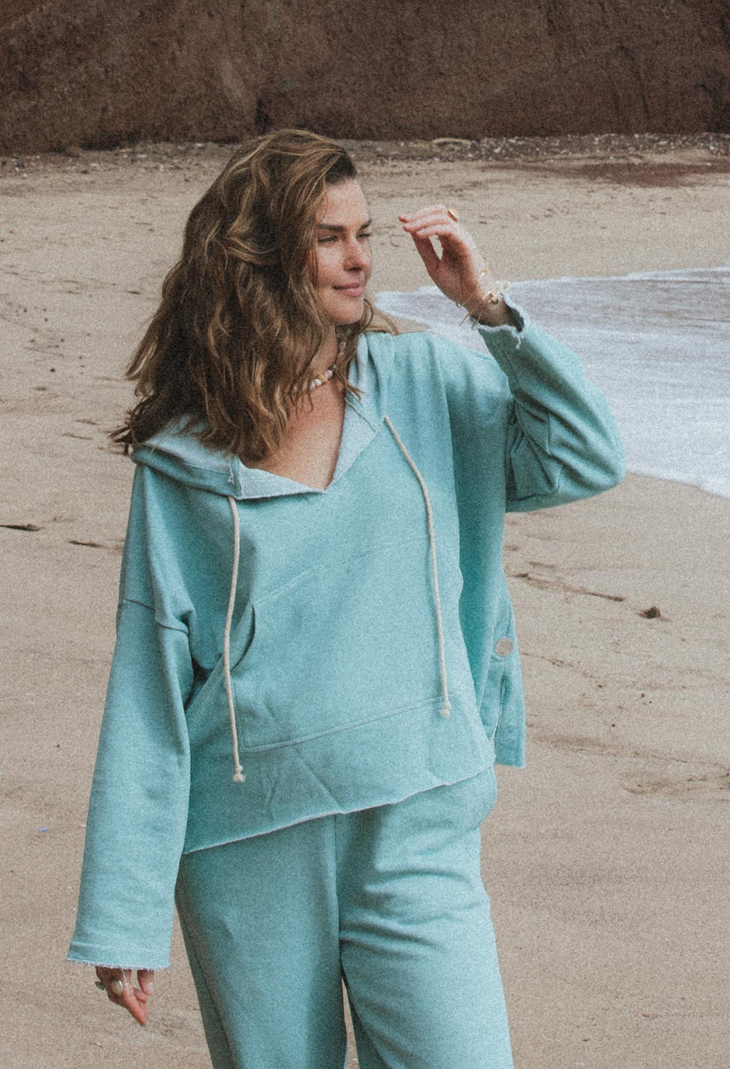 Wings Hawaii Beach Hoodie sweatshirt in aqua blue. 100% cotton french terry. Elevated apparel, sustainable essentials for coastal living. Designed in Maui, sewn in LA. 