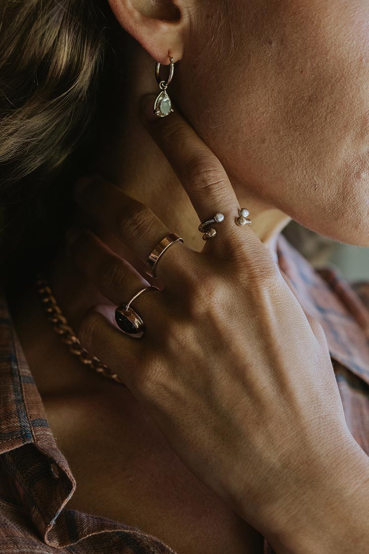A Womens ring in the shape of a horse shoe