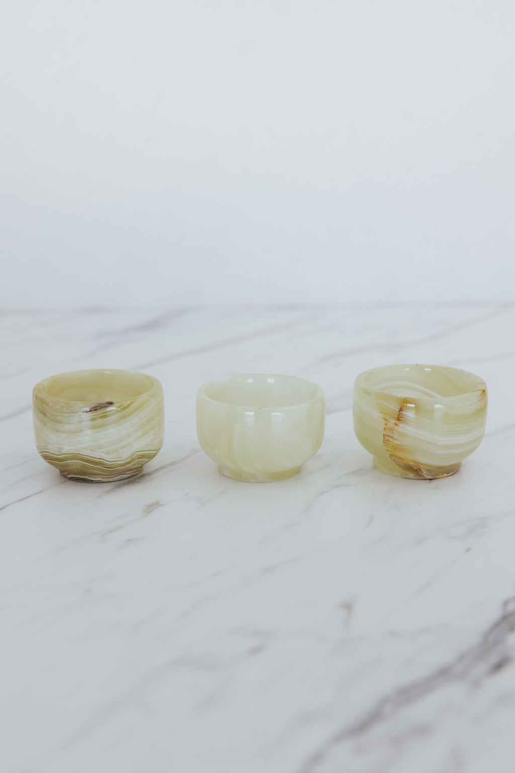 Wings Hawaii jade green striped onyx jewelry bowls. Small dishes for holding trinkets. Unique gifts and home decor from Maui. 
