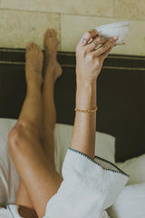 Model wearing Wings Hawaii Chain Reaction Bracelet in gold fill  thumbnail
