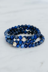 Wings Hawaii Lapis Lazuli stretchy beaded bracelet with 14k gold-filled tag. Crystal chakra healing. Boho-chic spiritual jewelry hand made in Maui. thumbnail