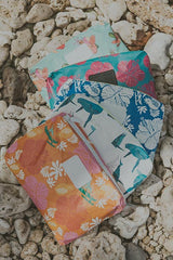 A collection of Wings Hawaii foldable adventure pouches  thumbnail