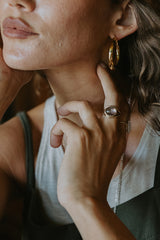 Lavender Tourmaline set in a 14K Yellow Gold Evil Eye Band thumbnail