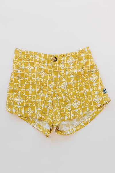 Wings Hawaii retro pocket shorts in quilted ulu and plumeria print in marigold - front