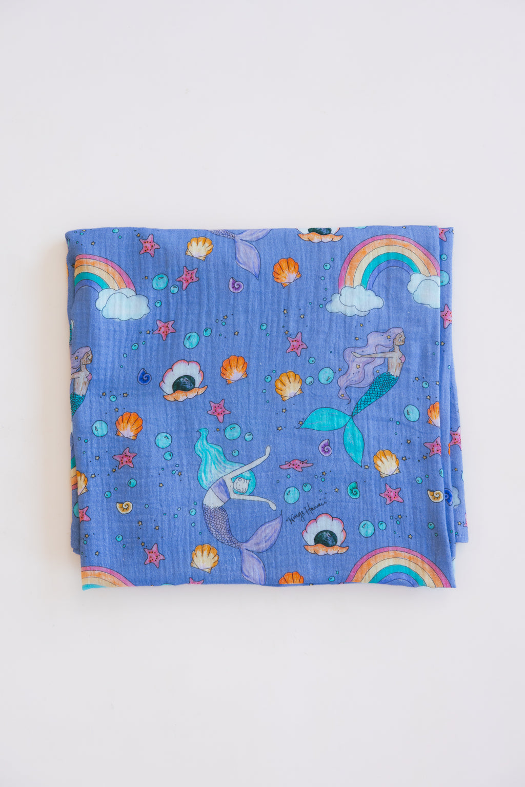 Wings Hawaii baby swaddle blanket with mermaid print. Original artwork designed in Maui. Best baby shower gifts, nursing cover, new mommy gifts. Island style keiki accessories. Mermaids, rainbows, seashells, under the sea theme. 