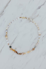 Wings Hawaii Mermaid's Treasure Necklace. Real Hawaiian cone shells and Tahitian pearls choker handcrafted in Maui. Elevated shell jewelry handmade in Hawaii.  thumbnail