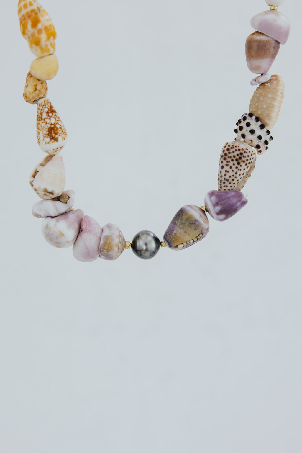 Wings Hawaii Mermaid's Treasure Necklace. Real Hawaiian assorted shells and Tahitian pearls choker handcrafted in Maui. Elevated shell jewelry handmade in Hawaii. 