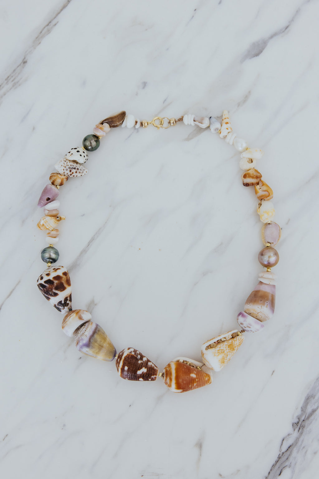 Wings Hawaii Mermaid's Hammah Necklace. Full shell lei handmade in Maui. Authentic Hawaiian seashells, Tahitian pearls, freshwater pearls, 14k gold-filled beads. Fine jewelry handcrafted with aloha in Hawaii. 