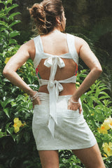 Wings Hawaii retro pocket mini skirt in Hana Pearl print. Neutral white/cream tropical aloha print skirt. Designed with aloha in Maui.  thumbnail