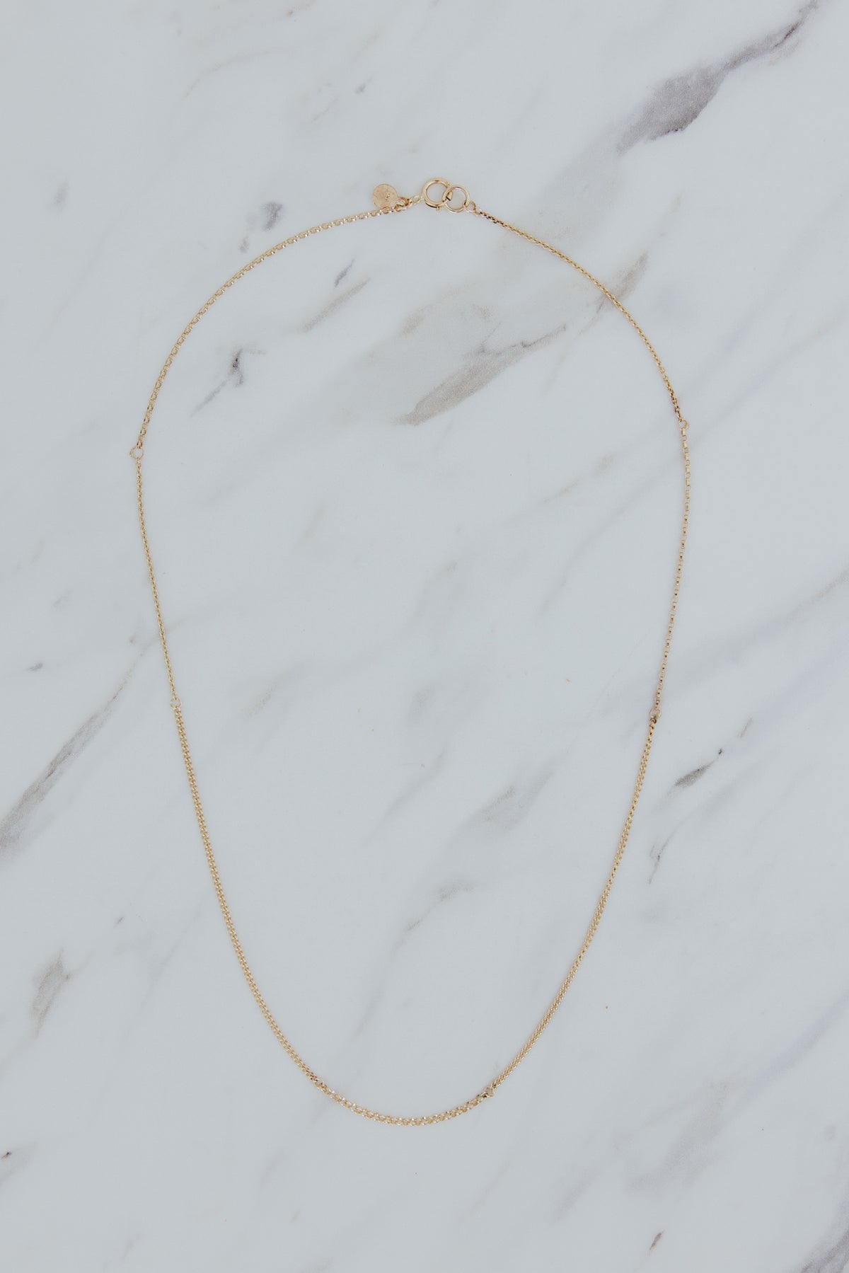 Wings Hawaii Mixed Chain Necklace in solid 14k yellow gold. Mix of curb, rolo, and round cable chains. Fine jewelry handcrafted in Maui. Perfect for layering or adding charms. 