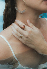 Wings Hawaii Halo ring – Sunstone in solid 14K rose gold. Fine jewelry handcrafted in Maui. Oval-cut gemstone, single prong-set on thick band. Made in Hawaii gifts. thumbnail