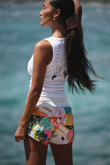 Wings Hawaii White Wing Tank. Angel wings in black print on white cotton tank top. Screenprinted by hand in Haiku, Maui. Original, sustainable, slow fashion made in Hawaii.  thumbnail