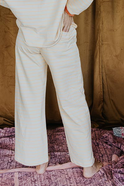 wings hawaii pau hana pants in neon stripe, shown with matching boxy long sleeve top 