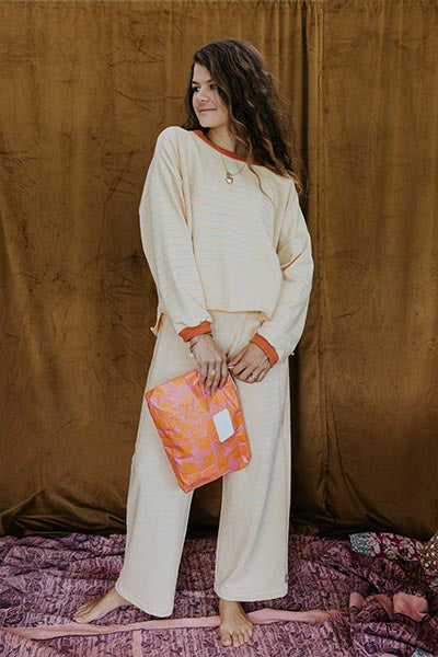 wings hawaii pau hana pants in neon stripe, shown with matching boxy long sleeve top 