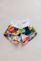Wings Hawaii Patchwork Pau Hana Shorts in Daisy Lane. Handmade, one of a kind, upcycled vintage quilt fabric. Cozy cotton waistband and back pocket. Made with aloha in Maui. Sustainable, small batch, slow fashion.  thumbnail