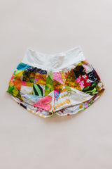 Wings Hawaii Patchwork Pau Hana Shorts in Daisy Lane. Handmade, one of a kind, upcycled vintage quilt fabric. Cozy cotton waistband and back pocket. Made with aloha in Maui. Sustainable, small batch, slow fashion.  thumbnail